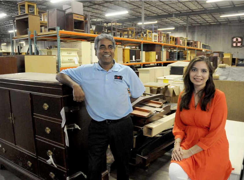 Saima Seyar with Oli Mohammed of Furniture Bank at his new facility